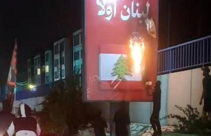 الجيش يوقف شخصين أحرقا صورة العلم اللبناني على طريق المطار