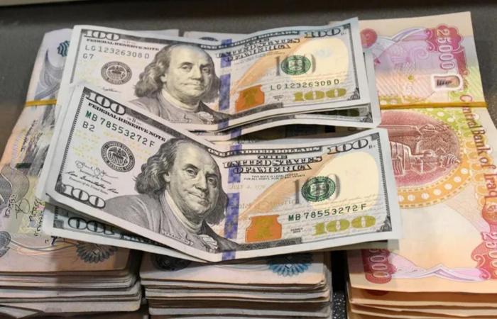 العراق يرفع سعر الدولار